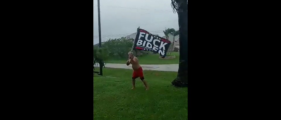 FJB! Newly-Minted American Legend Just Braved Hurricane Ian Shirtless To Wave A ‘F*ck Biden’ Flag