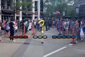Both sides of this University of Alabama protest started chanting the same thing. Can you guess what it was?