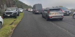 IDIOTS: Residents, visitors gather at Tantalus lookout during tsunami warning