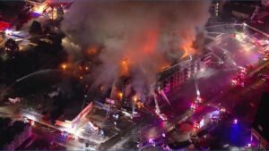 Apartment building in Denver under construction still burning more than 14 hours later