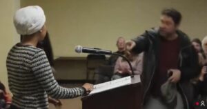 Man Charges at Ilhan Omar, Sprays Her with Unknown Substance During Town Hall