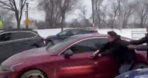 MOGADISHU ALERT — WATCH: Somali Woman Robs Independent Journalist Nick Sortor in Minneapolis Then Drives Off, Dragging Him Down the Street Before Leftists Surround and Threaten Him – FBI Responds