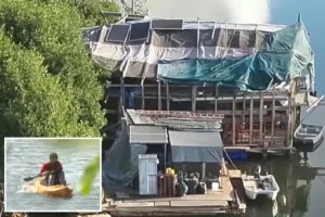 Hawaii’s homeless avoid encampment sweeps using massive, two-story houseboat with solar panels