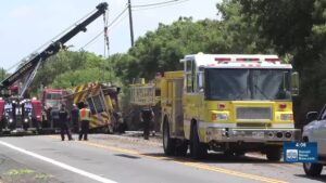 Crews move overturned firetruck blocking Highway 11 in Kau