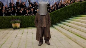 Hobo With Garbage Can Stuck On His Head Mistaken For Met Gala Attendee