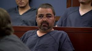 Las Vegas double murder suspect in court with battered, bruised face