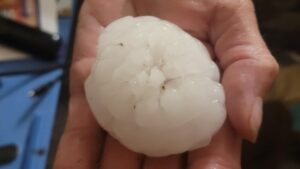 Large hail hit Wiggins area, damaging homes and vehicles
