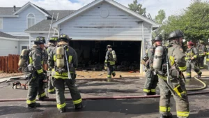 Lithium-ion battery catches fire while charging in an Aurora garage, causes smoke damage