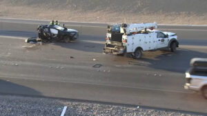 Two people extricated, hospitalized after utility truck crash in northwest Las Vegas