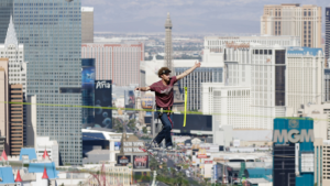 Record-breaking daredevil who performed at Super Bowl with Madonna dies in BASE jumping tragedy near Moab, Utah