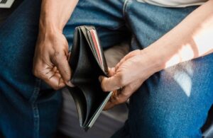 A LICENSE TO STAY POOR: America tells struggling people to become entrepreneurs—then charges them for permission to earn a living