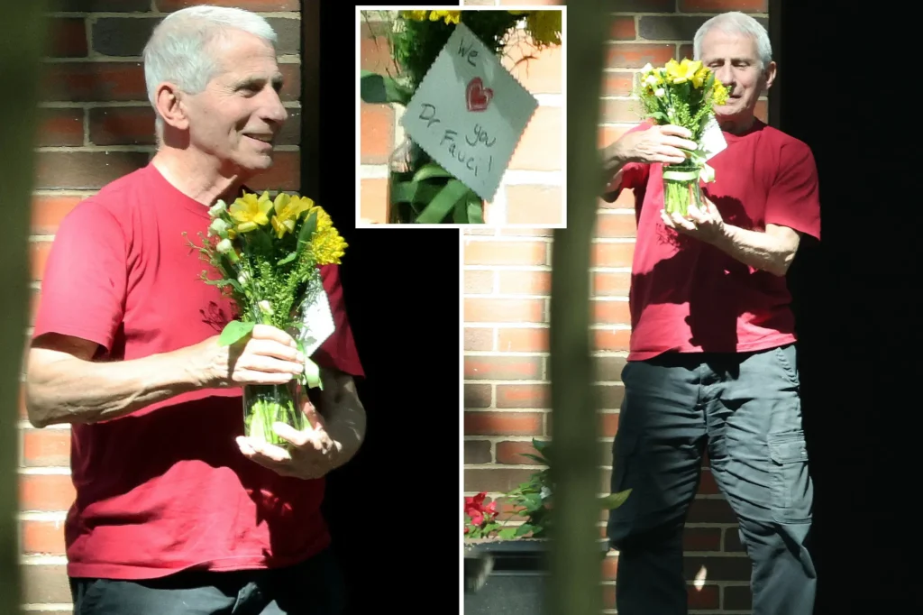 BEST BUDS: Limelight-loving Fauci all smiles as he’s surprised by flowers left by adoring fan — or did he send them to himself?