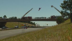 Procession honors fallen Gold Mountain Fire pilot on route from Montrose to Denver airport