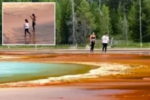 NATURAL DISGRACE: Yellowstone ‘tourons’ spark outrage after trampling over park’s most dangerous landmark