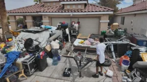 Neighbors frustrated over cluttered West Las Vegas property as homeowner says she needs help