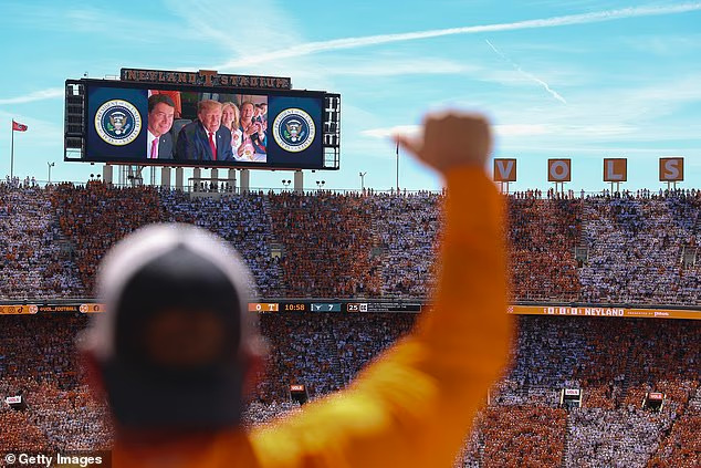 Trump met with roaring cheers from college football fans in Tennessee after Air Force One flyover