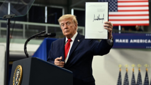 FULL SPEED AHEAD: Trump signs pardons for Alaska diesel mechanics onstage during rally touting major energy deals